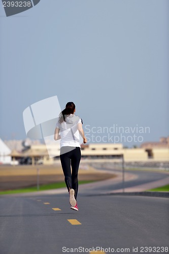 Image of woman jogging at morning