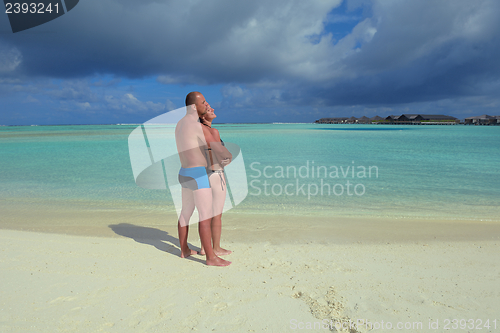 Image of happy young couple have fun on summer