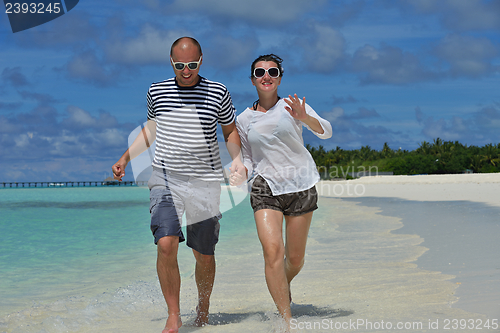 Image of happy young couple have fun on summer