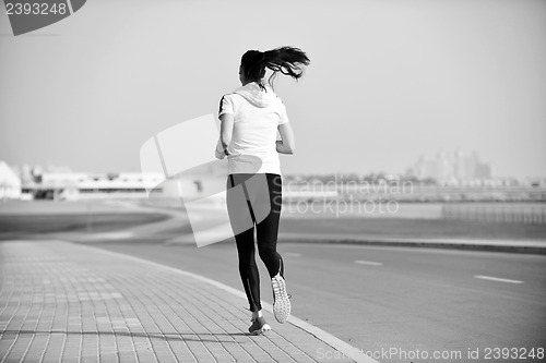 Image of woman jogging at morning