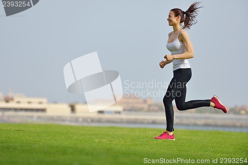 Image of woman jogging at morning