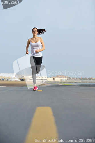 Image of woman jogging at morning