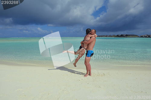 Image of happy young couple have fun on summer