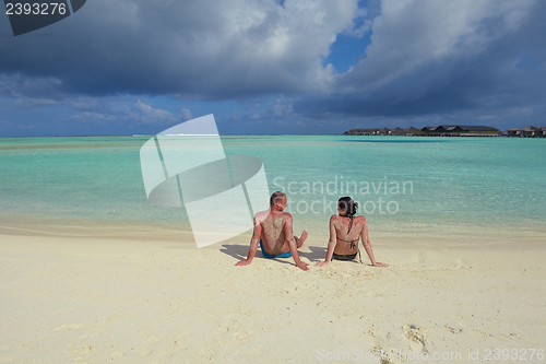 Image of happy young couple have fun on summer