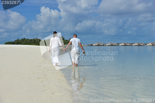 Image of happy young couple have fun on summer