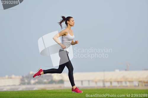 Image of woman jogging at morning