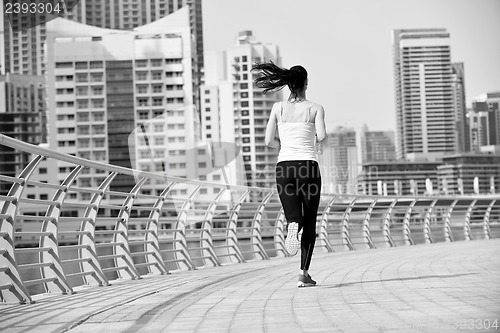 Image of woman jogging at morning