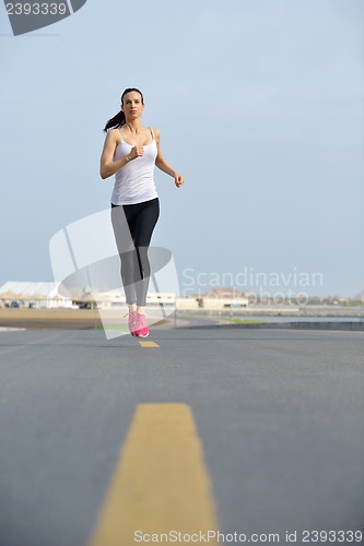 Image of woman jogging at morning