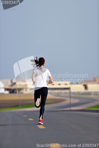 Image of woman jogging at morning