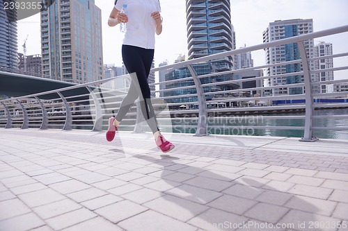 Image of woman jogging at morning