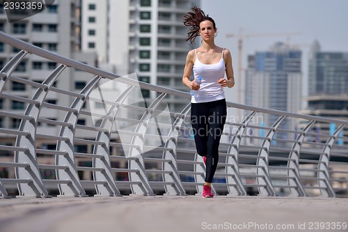 Image of woman jogging at morning