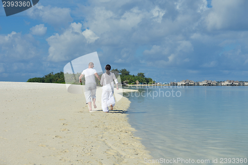 Image of happy young couple have fun on summer