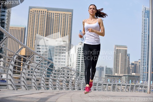 Image of woman jogging at morning