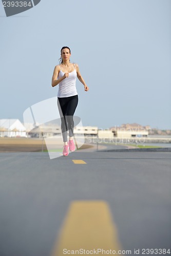 Image of woman jogging at morning