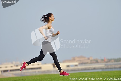 Image of woman jogging at morning