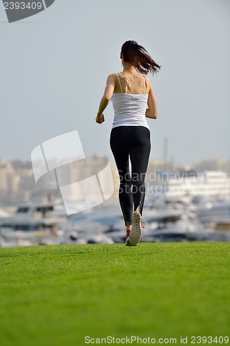 Image of woman jogging at morning