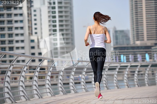 Image of woman jogging at morning