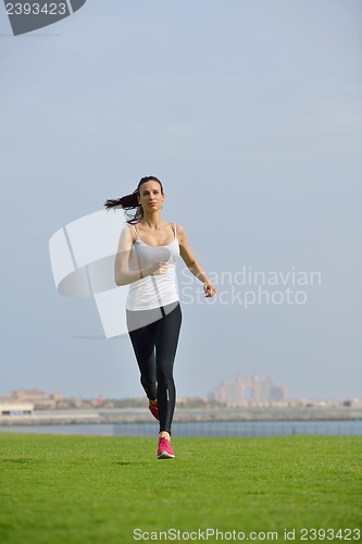 Image of woman jogging at morning