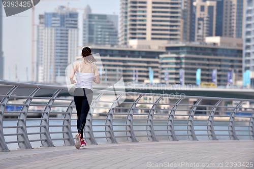 Image of woman jogging at morning