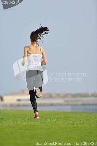 Image of woman jogging at morning