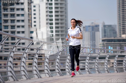 Image of woman jogging at morning