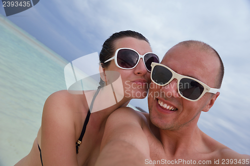 Image of happy young couple have fun on summer