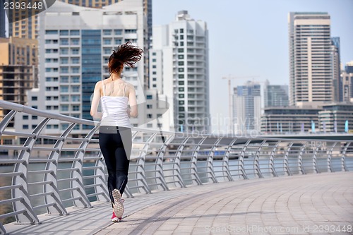 Image of woman jogging at morning