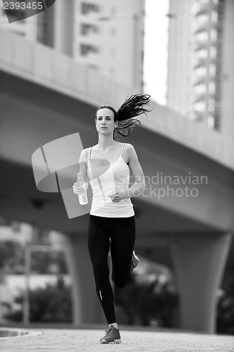 Image of woman jogging at morning