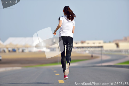 Image of woman jogging at morning