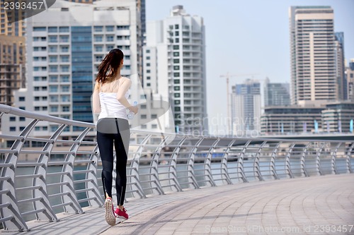 Image of woman jogging at morning