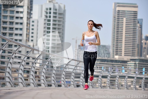 Image of woman jogging at morning