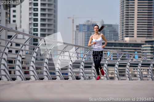 Image of woman jogging at morning