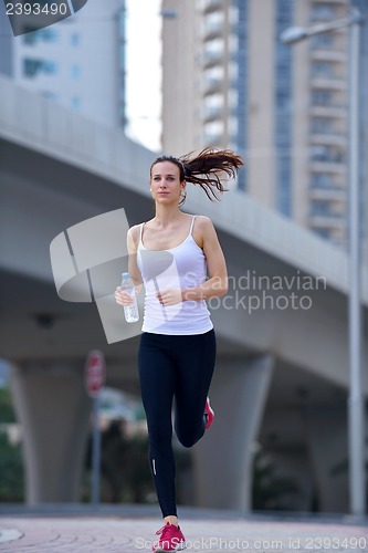 Image of woman jogging at morning