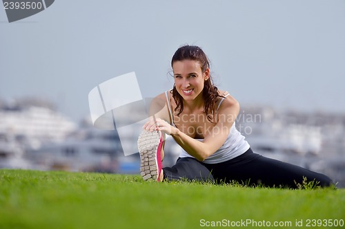 Image of Young beautiful  woman jogging  on morning
