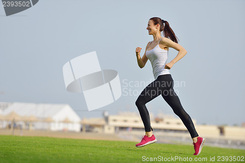 Image of woman jogging at morning