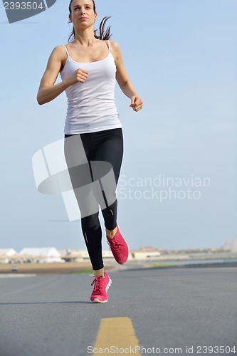 Image of woman jogging at morning