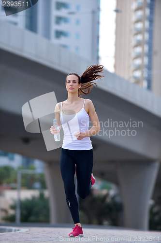 Image of woman jogging at morning