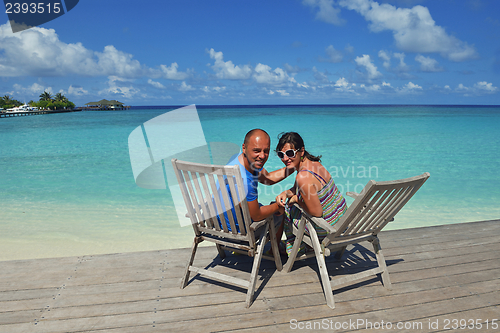 Image of happy young couple have fun on summer