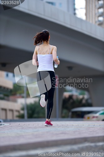 Image of woman jogging at morning