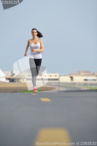Image of woman jogging at morning