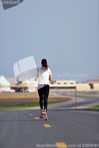 Image of woman jogging at morning