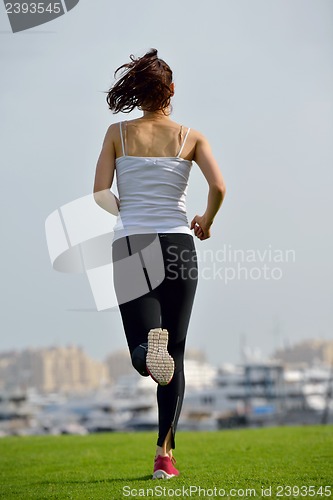 Image of woman jogging at morning