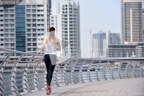 Image of woman jogging at morning