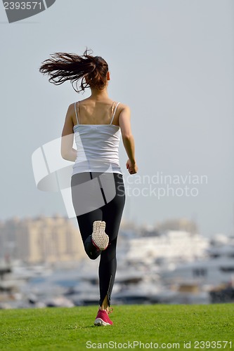 Image of woman jogging at morning