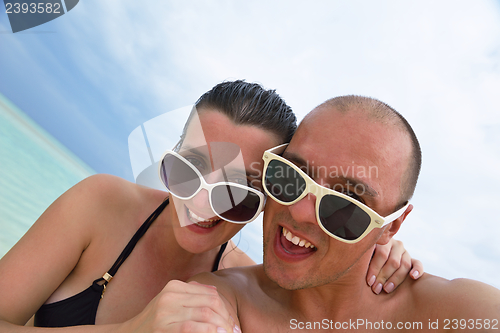 Image of happy young couple have fun on summer