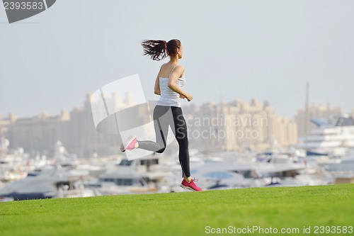 Image of woman jogging at morning