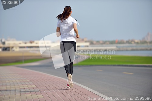 Image of woman jogging at morning