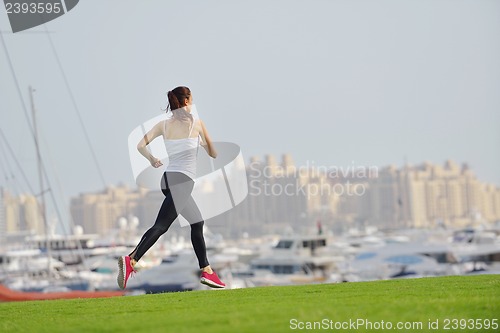 Image of woman jogging at morning