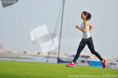 Image of woman jogging at morning