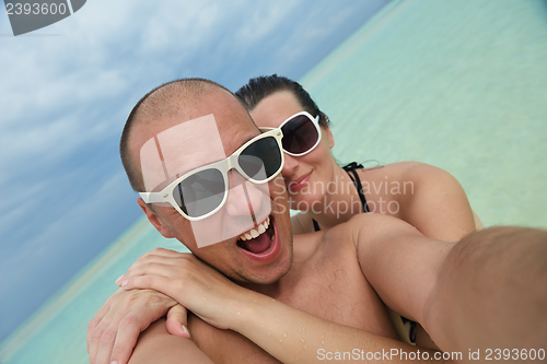 Image of happy young couple have fun on summer